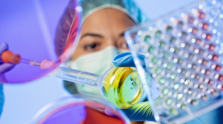 photograph of a scientist doing an experiment