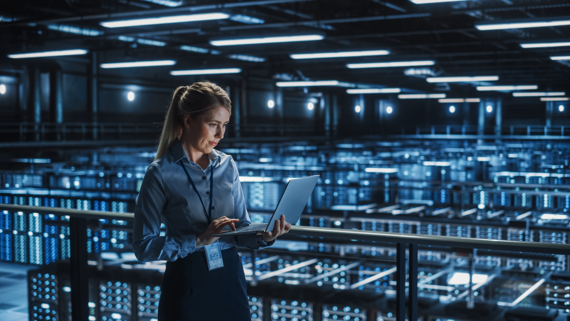 photograph of a woman in a server farm