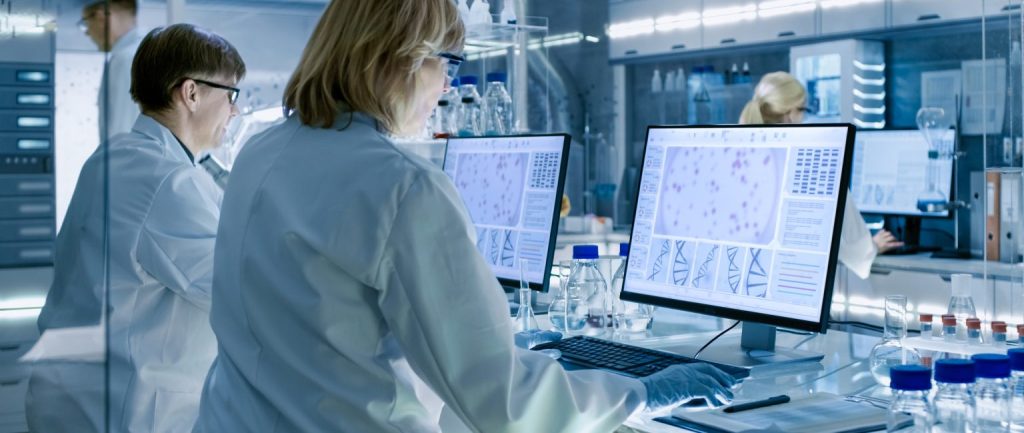 people working in a lab setting on computers